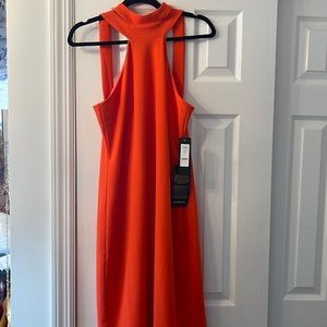 Brand New, Never Worn BEBE orange midi